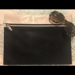 Black and cream color block clutch